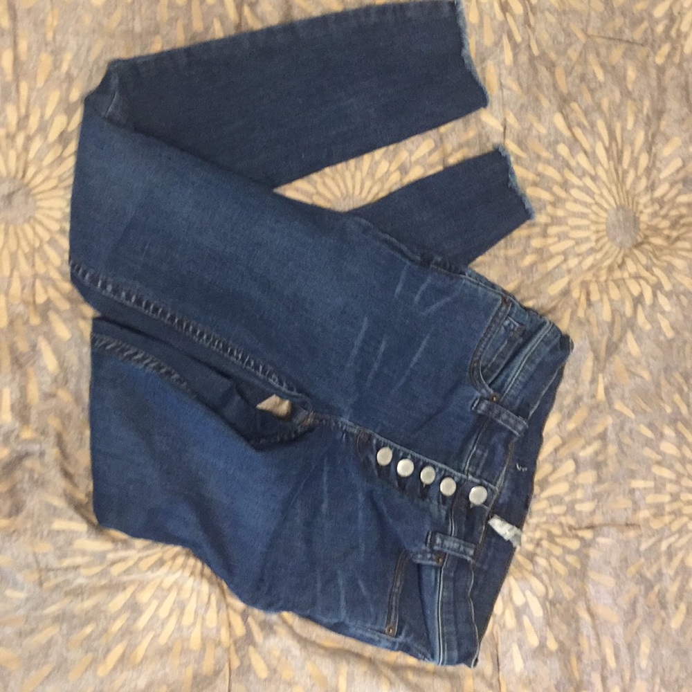 Mid rise, dark wash, skinny jean size 25
